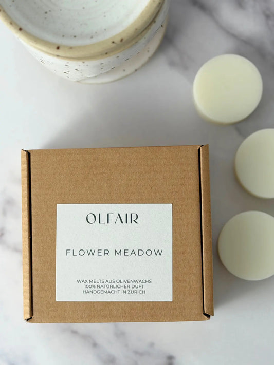 Flower Meadow Duftwachs auf einem Marmor Hintergrund